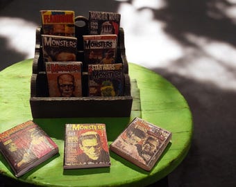 1:12 scale dollhouse minature magazine rack with universal monster magazines, classic monster novels or Stephen King novels.