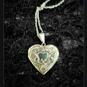Gothic heart locket necklace with bat.