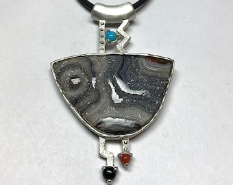 Sterling Silver Pendant by Link Wachler. The Eileene Collection. Chalcedony, Turquoise, Coral, Black Onyx and Rubber Cord