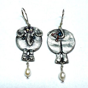 Bringing Up The Rear. Sterling silver elephant earrings with pearls and bird on tail
