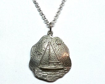 Sailboat Pendant. Nighttime Scene in Sterling Silver by Link Wachler. Sterling Silver Chain.