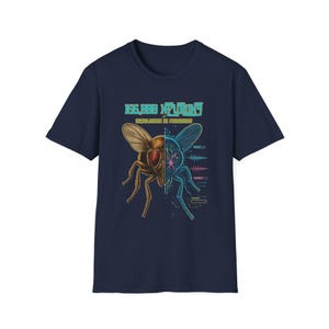 May include: A navy blue short-sleeve t-shirt featuring a graphic of a fly split into two halves: one side is brown and organic, while the other is blue and digital with circuitry. The text reads 166,888 NEURONS SIMULATION IN PROGRESS.