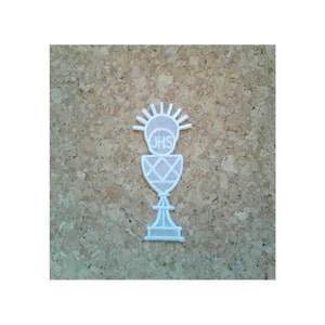 May include: White embroidered patch of a chalice with a sunburst above and the letters "JHS" inside the chalice.