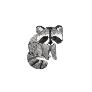 May include: A gray and black embroidered raccoon sitting on its haunches with its tail curled around its body.