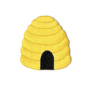 May include: A yellow embroidered beehive with a black entrance. This beehive is a cute and whimsical design for a patch or applique.