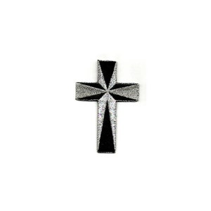 May include: Black and silver embroidered cross patch. The cross is outlined in black with a silver starburst design in the center.