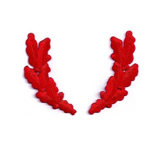 May include: Red embroidered laurel wreath, a decorative embellishment for crafts, clothing, or home decor.