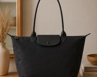 Bolso tote negro Longchamp para mujer, bolso grande de nailon con detalles de piel, bolso de hombro ligero, bolso ideal para el trabajo y los viajes.