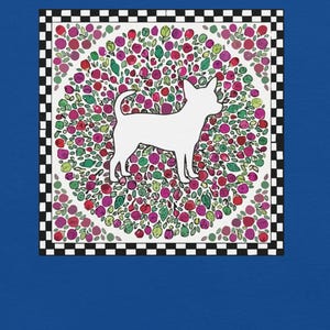 May include: A blue t-shirt featuring a square graphic print. The design displays a white silhouette of a dog centered within a circular arrangement of pink, red, and green floral shapes, all framed by a black and white checkered border.