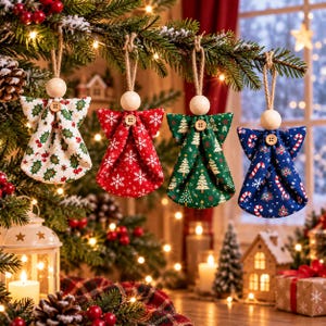 May include: Four fabric angel ornaments hanging from a Christmas tree. Each angel features a wooden bead head, a small wooden button at the neckline, and a unique festive pattern: holly leaves, white snowflakes on red, pine trees on green, and candy canes on blue.