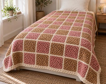 Haakpatroon voor een deken met puffsteken (PDF), sprei van chenille in zachtroze en karamelkleur.