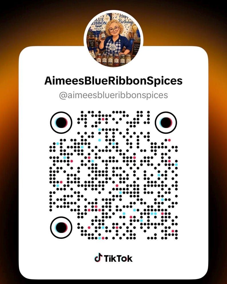May include: A white square TikTok QR code featuring the username AimeesBlueRibbonSpices and handle @aimeesblueribbonspices. At the top, a circular profile image shows a person with blonde hair wearing a blue shirt, surrounded by spice jars.