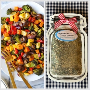 May include: A clear plastic jar with a red and white gingham ribbon bow contains a blend of dried herbs and spices labeled "Roasted Garlic & Roasted Onion Roasted Vegetables Aimee's Blue Ribbon Spices". A white plate with a colorful assortment of roasted vegetables, including broccoli, mushrooms, bell peppers, squash, and zucchini, is shown next to the jar.