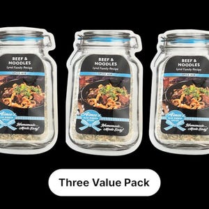 May include: Three clear plastic pouches with a blue ribbon design, each containing a spice mix for beef and noodles. The pouches are labeled "Beef & Noodles Lynd Family Recipe Spice Mix" and feature a picture of a bowl of noodles with beef. The pouches are arranged in a row with the text "Three Value Pack" below them.