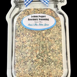 May include: A jar-shaped pouch containing Lemon Pepper Rosemary Seasoning spice mix. The label reads Lemon Pepper Rosemary Seasoning Spice Mix Aimee's Blue Ribbon Spices. A blue and white gingham ribbon is tied around the top of the jar graphic.