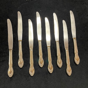 Eight Rogers Lady Densmore Basque or Woodland Rose silverplate knives