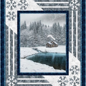 May include: A snowy winter scene with a cabin in the woods. The cabin has a chimney with smoke coming out of it. There is a small pond in front of the cabin with a bridge leading to it. The trees are covered in snow and the sky is gray.
