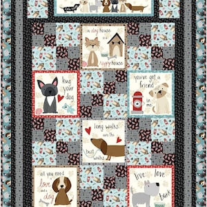 May include: A colorful quilt with a dog theme. The quilt features various dog breeds and phrases like "hug your dog", "long walks are the best walks", and "all you need is love and a dog".