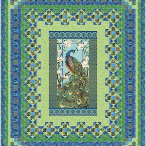 May include: A green, blue, and gold quilt with a peacock design in the center. The peacock is surrounded by flowers and leaves. The quilt is made up of squares and triangles.