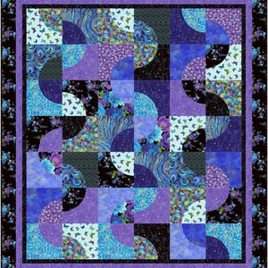 May include: A quilt with a geometric pattern of purple, blue, and black half-circles. The fabric has a floral and butterfly print.