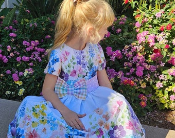 Daisy Dress pattern directions to make a girls dress in sizes 4, 6 and 8 years old