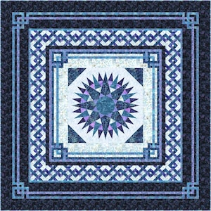 May include: A square quilt with a starburst design in shades of blue, purple, and white. The center features a detailed star pattern, surrounded by geometric borders and a dark blue patterned edge. The quilt showcases intricate stitching and a symmetrical layout.