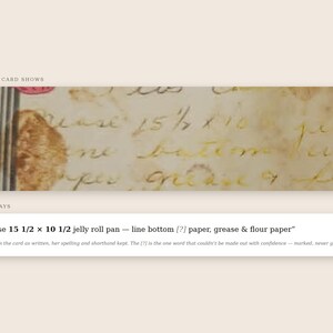 May include: A rectangular off-white recipe card featuring handwritten cursive text with brown stains. The text reads: grease 15 1/2 x 10 1/2 jelly roll pan — line bottom [?] paper, grease & flour paper. The card includes a printed transcription below.