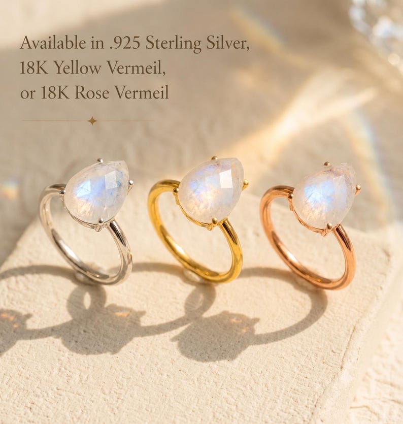 Moonstone teardrop rings shown in .925 sterling silver, 18K yellow vermeil, and 18K rose vermeil finishes with text overlay. A June birthstone ring available in silver, gold, and rose gold, perfect as a birthday gift, gift for her, or gemstone ring.