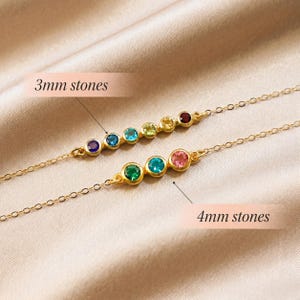 Custom mom birthstone bracelet with tiny gemstone accents on a slim chain, designed to symbolize children or grandchildren in a refined handmade jewelry piece.