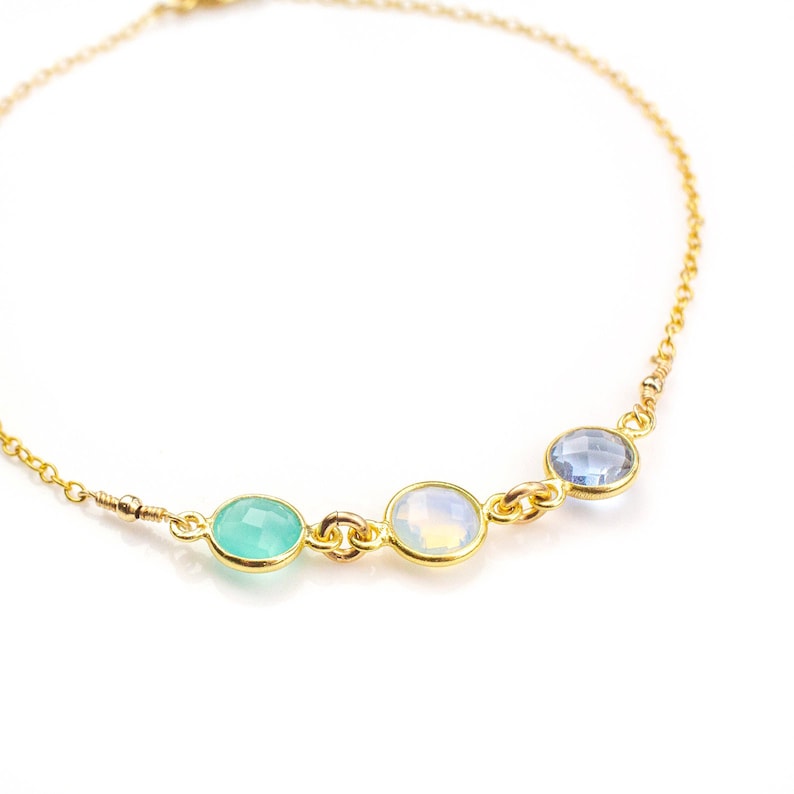 A gold triple gemstone ankle. Aqua Chalcedony jewelry, Opalite jewelry, Alexandrite jewelry, stones for luck, stones for love, stones for friendship, stones for teamwork, stones for meditation, stones for intuition, metaphysical stones in jewelry
