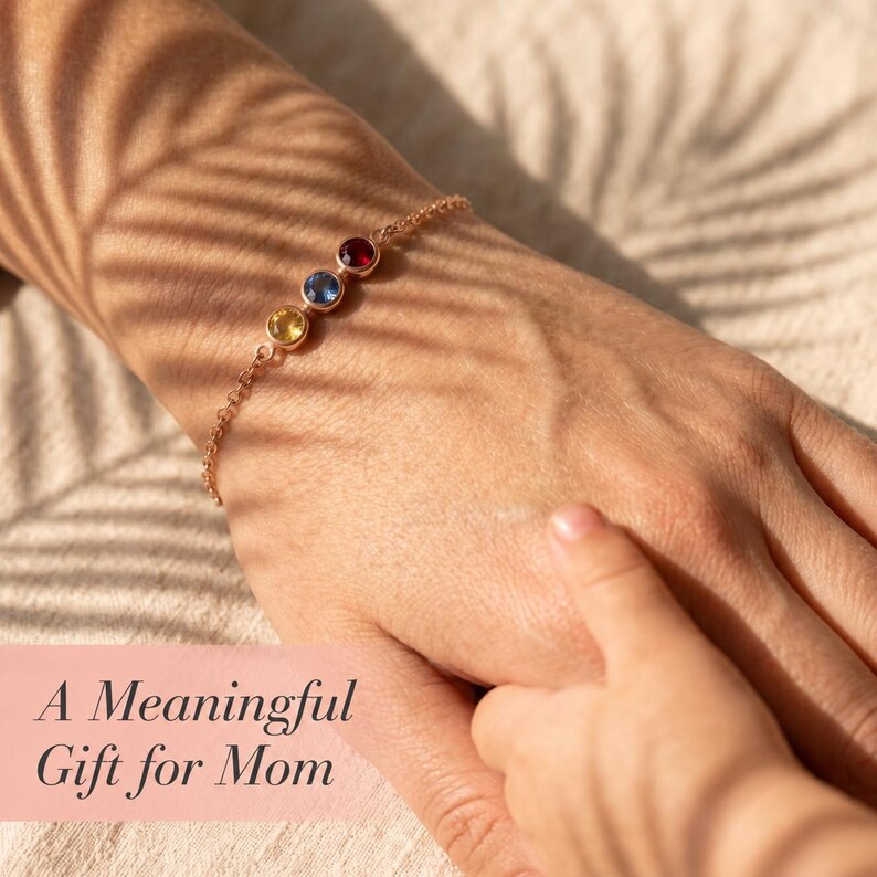 Sterling silver birthstone bracelet with a dainty gemstone bar and fine chain, handmade as a personalized family jewelry gift for mom, grandma, or loved ones.