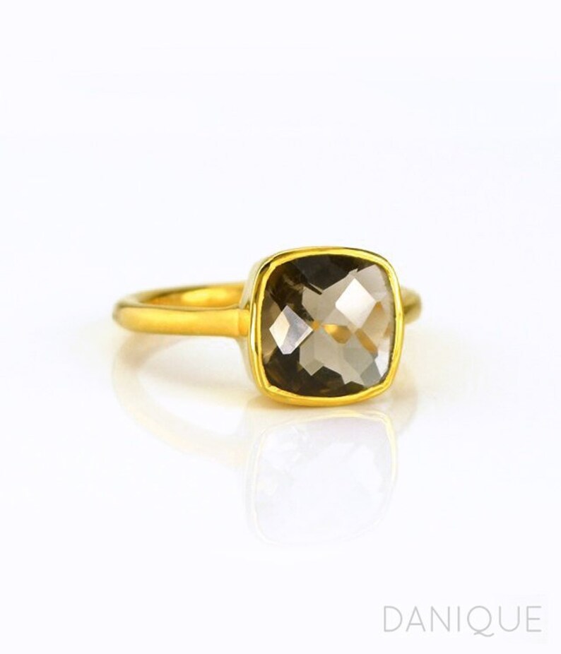 Smoky quartz cushion cut ring on hand, gold bezel set gemstone ring for everyday wear