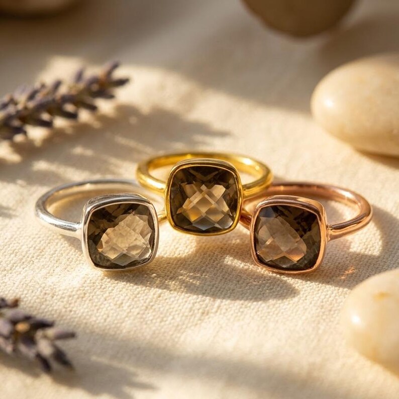 Smoky quartz ring worn on hand neutral styling soft natural lighting