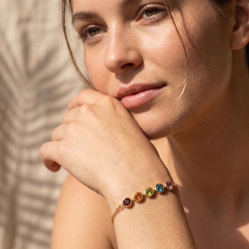 Personalized birthstone bar bracelet with tiny bezel set gemstones on a delicate chain, designed as a meaningful family bracelet for mom, grandma, or loved ones and handmade as a custom birthstone jewelry gift.