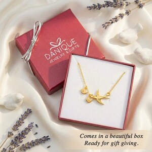 Gift-ready packaging photo with Danique-style box, personalized mama bird necklace presented as a Mother’s Day, birthday, or baby shower gift.