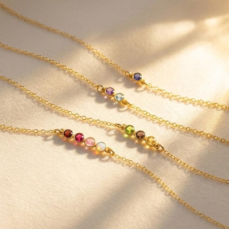 Rose gold birthstone bar bracelet with tiny colorful gemstones on a delicate chain, a meaningful personalized bracelet for mom or grandma and a beautiful gift.