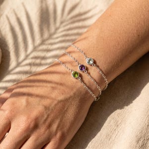 Family birthstone bracelet with a delicate gemstone bar, designed for moms and grandmothers who want a personalized keepsake that symbolizes loved ones.