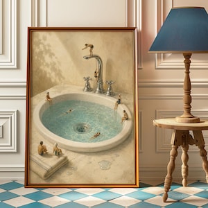 May include: A framed surrealist print depicting a bathroom sink filled with clear water, featuring tiny figures swimming and lounging around the basin. A chrome faucet stands at the back, with one figure diving from the spout and another climbing it.