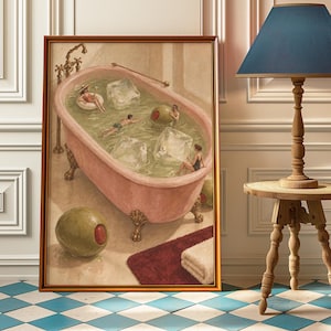 May include: A framed wall art print depicting a pink clawfoot bathtub filled with a pale green liquid, large ice cubes, and small figures swimming. A large green olive with a red pimento sits on the floor next to the tub in the illustration.