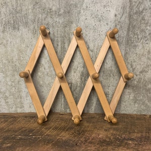 Collapsible hat rack shop