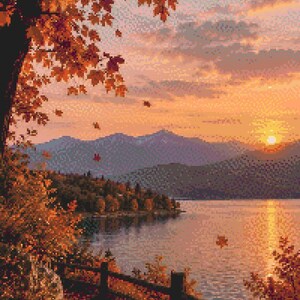 Op de afbeelding: Een pixel art landschap met een zonsondergang boven een meer met bergen in de verte. Een houten hek staat langs een pad bedekt met gevallen oranje en rode herfstbladeren. Esdoorns met levendig herfstgebladerte omlijsten het tafereel links.