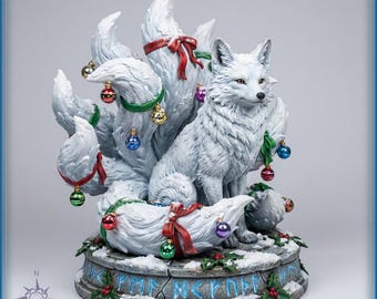 May include: A white nine-tailed fox figurine sitting on a stone-textured base with glowing blue runic inscriptions. The fox is adorned with red ribbons and small, colorful, spherical ornaments hanging from its multiple fluffy tails.