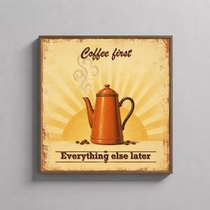 Puede incluir: Un cuadro cuadrado con fondo amarillo desgastado que muestra una cafetera naranja central con vapor. El texto Coffee first aparece arriba, y Everything else later está impreso debajo, junto a granos de café esparcidos por la base.