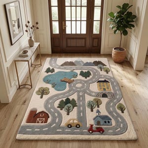 May include: A rectangular area rug featuring a cream background with a gray road network, a blue lake with a wooden bridge, green trees, brown mountains, a red barn, a yellow house, a blue building, a yellow car, and a red scooter.