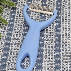 Vegetable Peeler for Kitchen, made in Thailand, KIWI Pro-peeler with Light Blue Handle