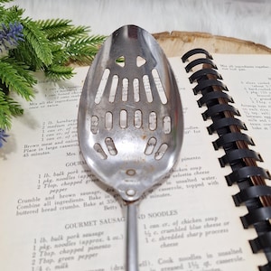 Vintage EKCO Chromium Plated Slotted Spoon with Black Plastic Handle ~ 1960s USA Made