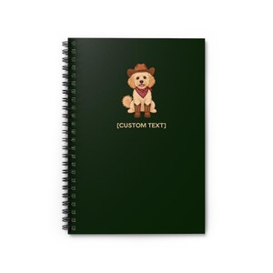 May include: A dark green spiral-bound notebook featuring a graphic of a light brown dog wearing a brown cowboy hat, a red patterned bandana, and brown cowboy boots. Below the dog illustration, the text [CUSTOM TEXT] is printed in gold.