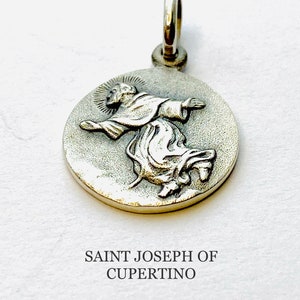 Saint Joseph of Cupertino. Sterling Silver Charm.