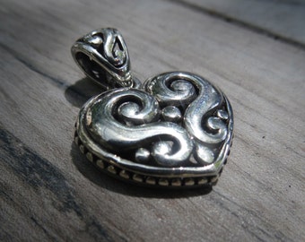 Vintage sterling silver heart with matching pendant bail.