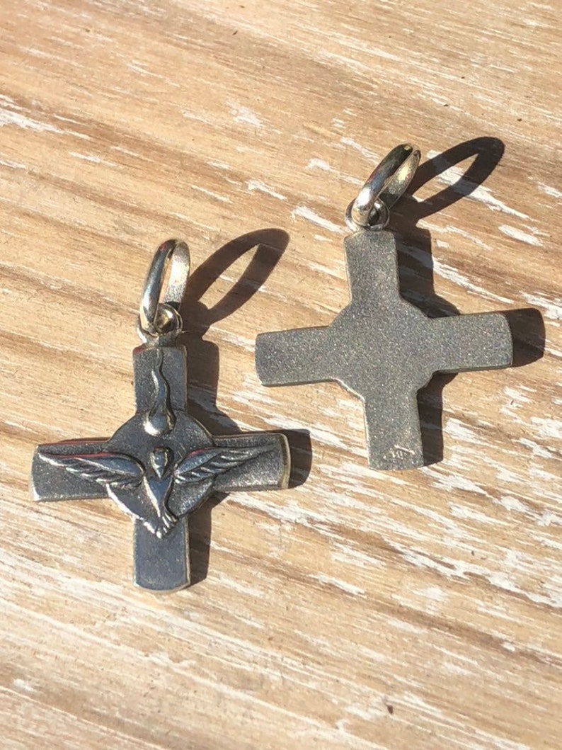 Holy Spirit Cross Sterling Silver.